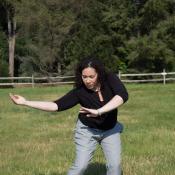 Elisha Clark Halpin Dancing in a field of green grass