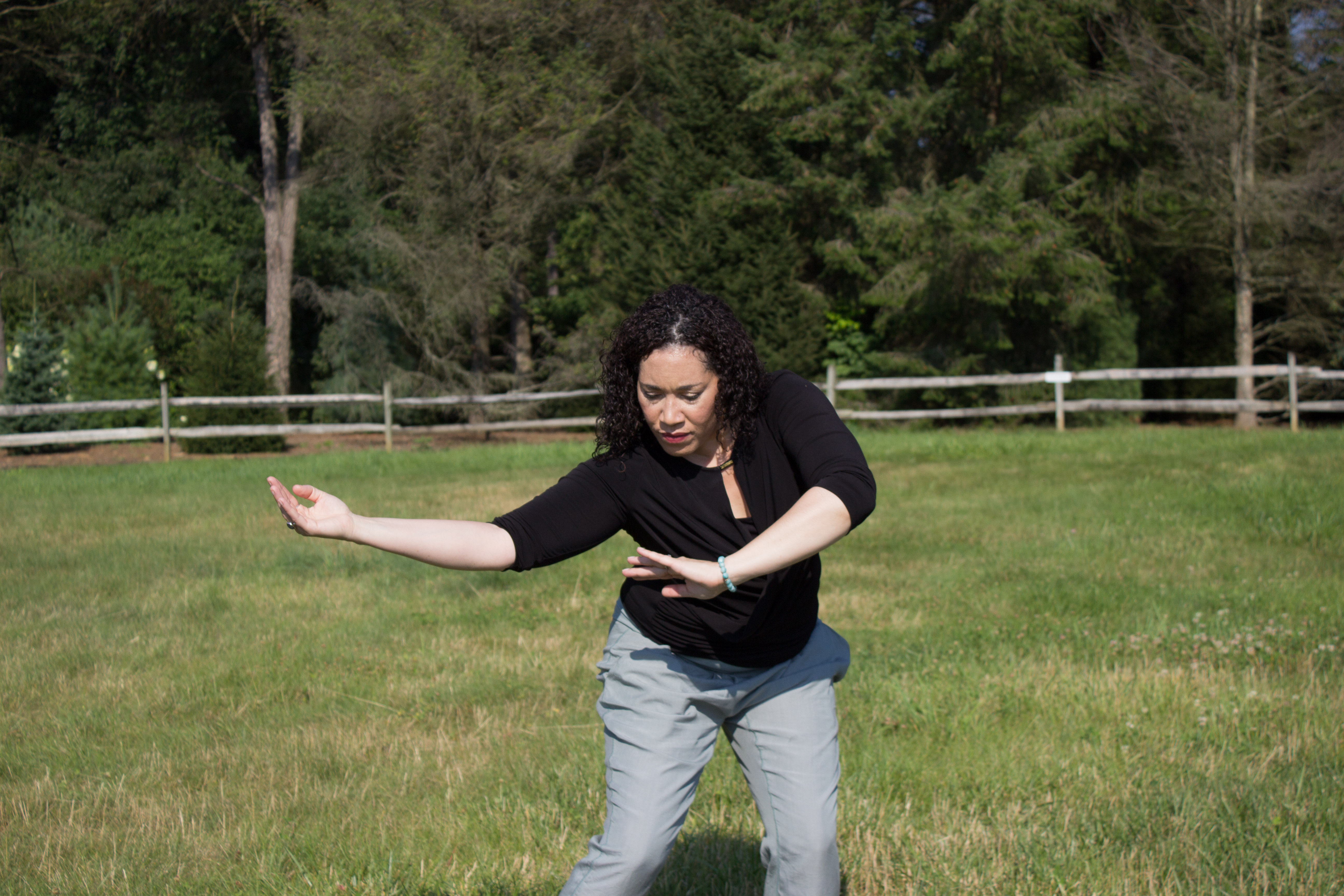 Elisha Clark Halpin Dancing in a field of green grass